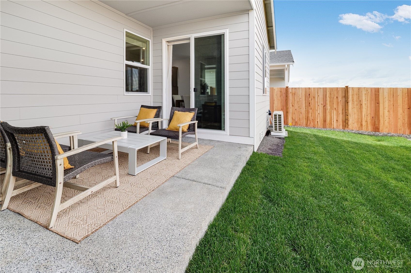 132 Moonshadow Lane Sequim, WA 98382 - Photo 26 of 28 a view of backyard of house with seating space