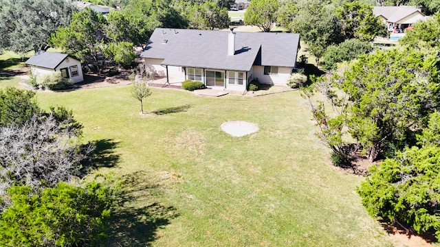 125 Kyle Lane Georgetown, TX 78633 - Photo 2 of 34 Aerial view of property and surrounding area featuring a tree filled landscape