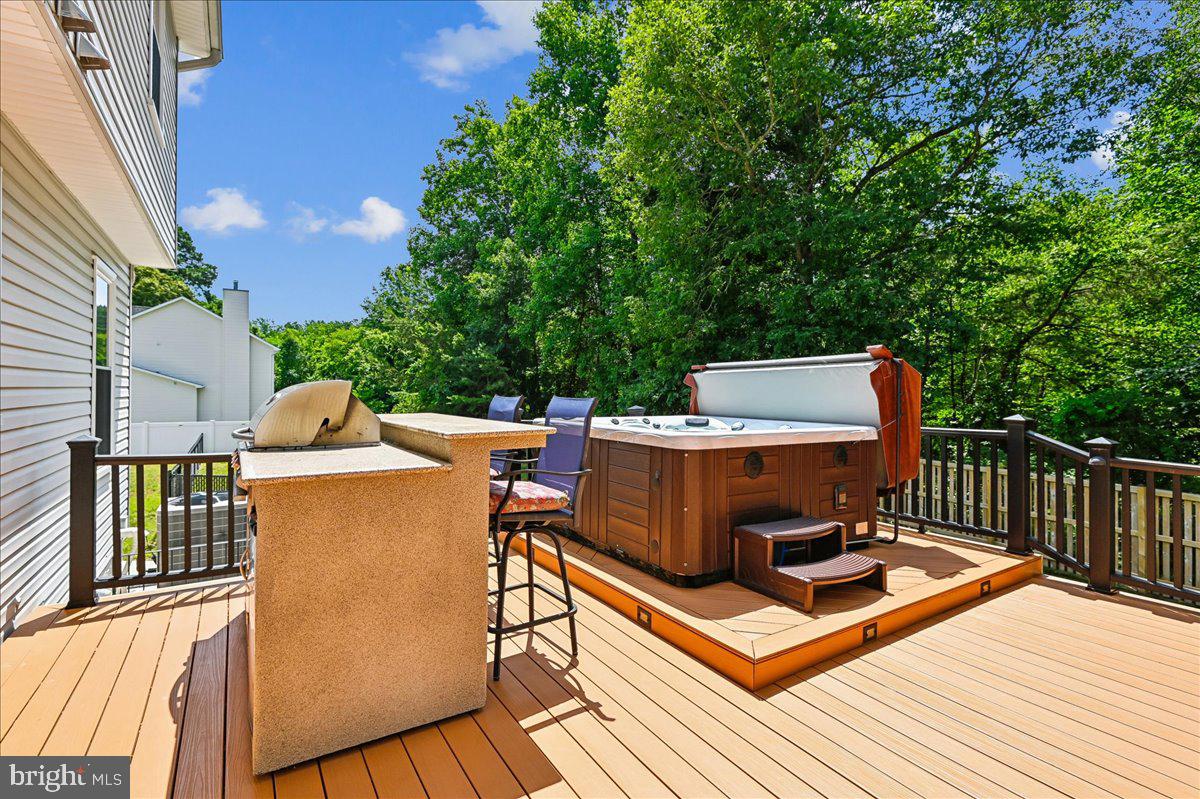 603 Queenstown Road Severn, MD 21144 - Photo 60 of 85 Serene deck with hot tub oasis.