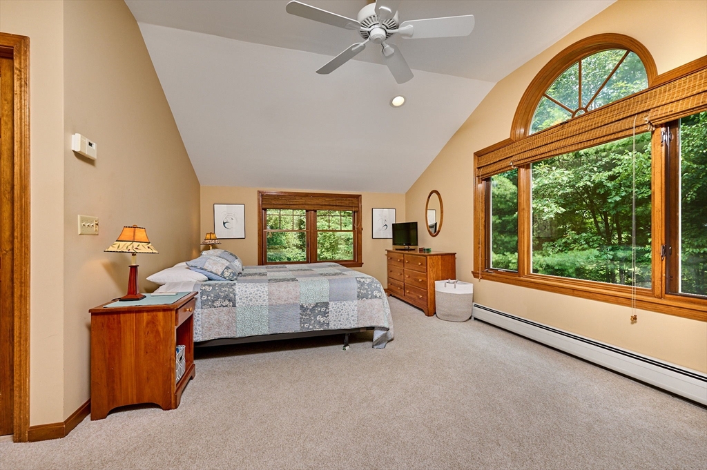 72 Reservation Road Sunderland, MA 01375 - Photo 14 of 38 a bed room with a bed and a large window