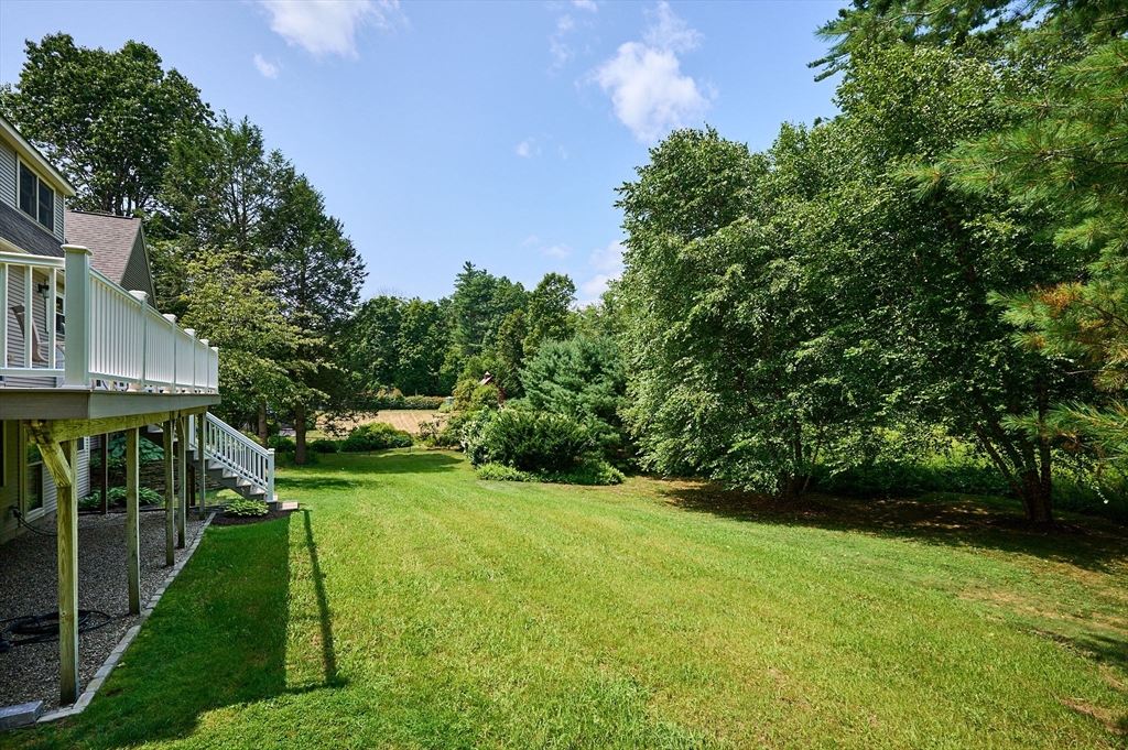 72 Reservation Road Sunderland, MA 01375 - Photo 28 of 38 a view of a house with a yard