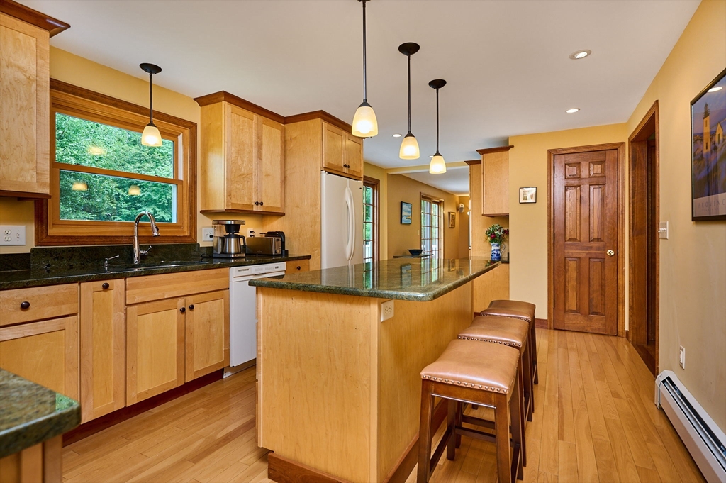 72 Reservation Road Sunderland, MA 01375 - Photo 6 of 38 a kitchen with stainless steel appliances granite countertop sink stove and refrigerator