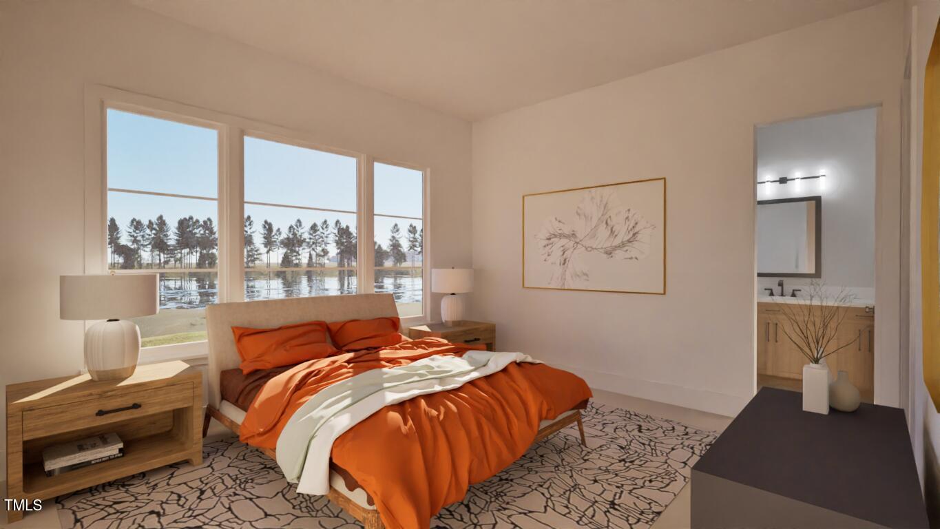 163 Forest Bridge Road Franklinton, NC 27525 - Photo 15 of 41 a bedroom with a bed and window