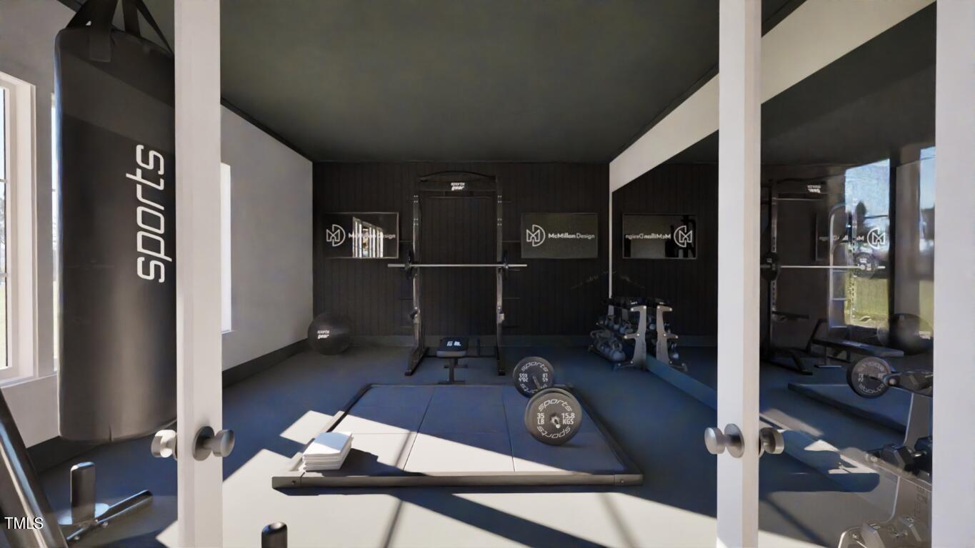 163 Forest Bridge Road Franklinton, NC 27525 - Photo 22 of 41 a view of a room with gym equipment