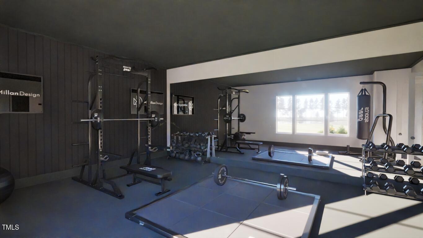 163 Forest Bridge Road Franklinton, NC 27525 - Photo 23 of 41 a room with gym equipment and large mirror