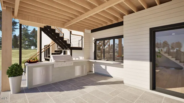 a building outdoor space with patio furniture and potted plants