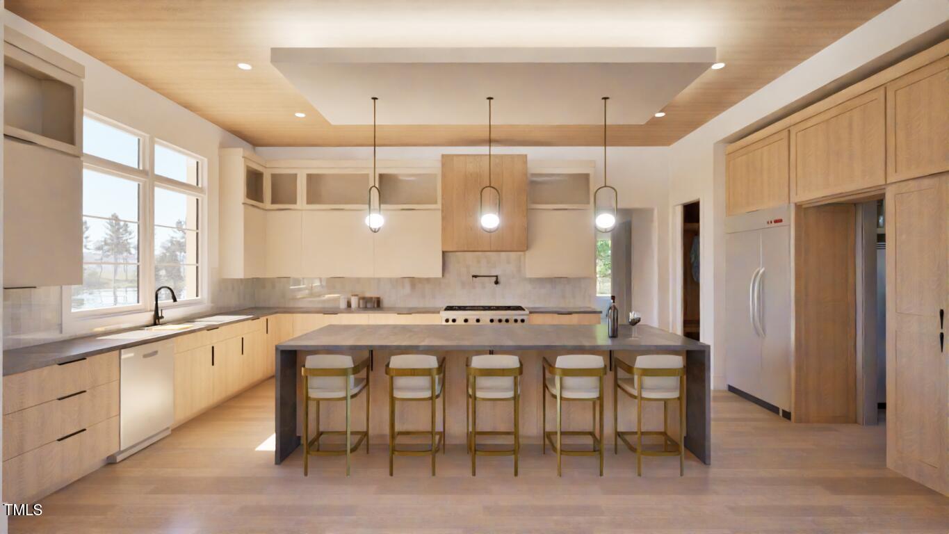 163 Forest Bridge Road Franklinton, NC 27525 - Photo 4 of 41 a large kitchen with a table and chairs