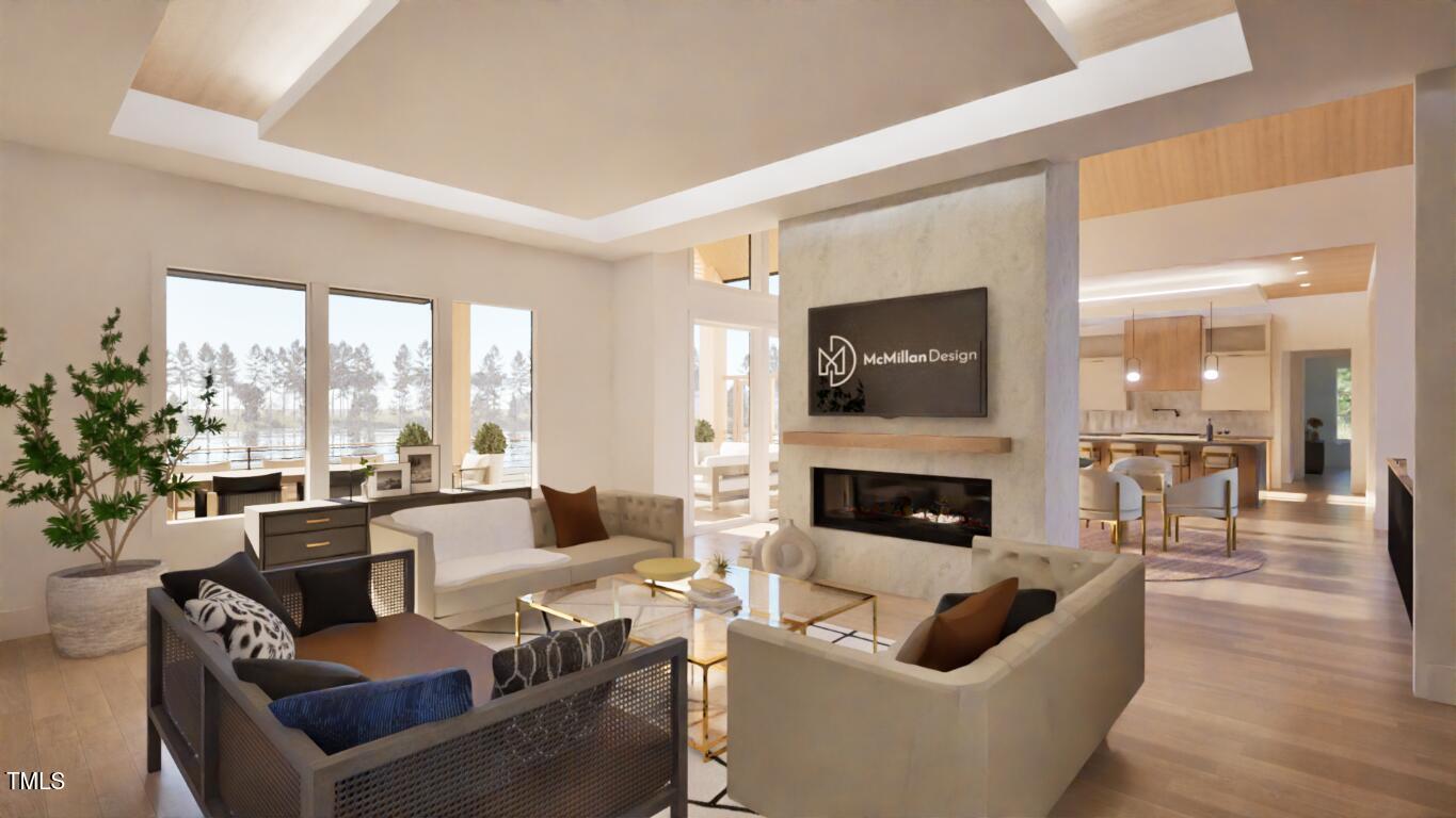 163 Forest Bridge Road Franklinton, NC 27525 - Photo 5 of 41 a living room with furniture fireplace and a large window