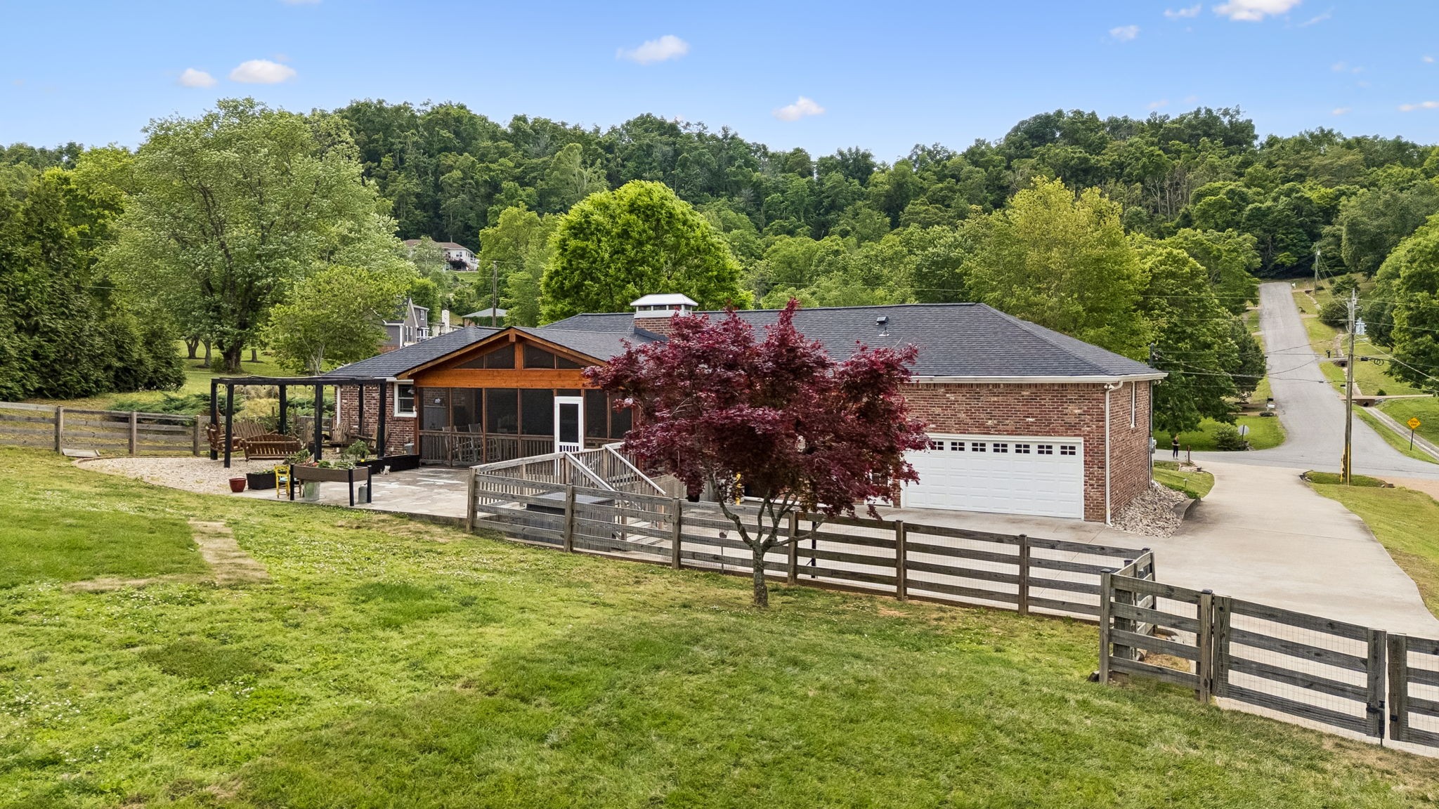 102 Azalea Lane Franklin, TN 37064 - Photo 28 of 41 a view of a house with a yard porch and sitting area