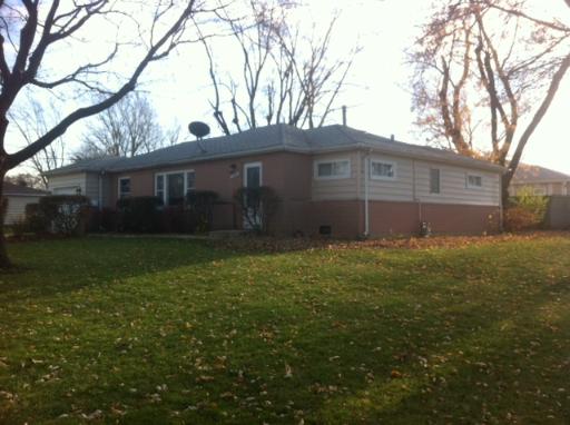 620 Geronimo Street Hoffman Estates, IL 60169 - Photo 1 of 8 a view of a house with a yard