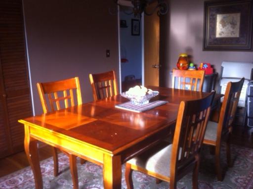 620 Geronimo Street Hoffman Estates, IL 60169 - Photo 2 of 8 a view of a dining room with furniture and chandelier