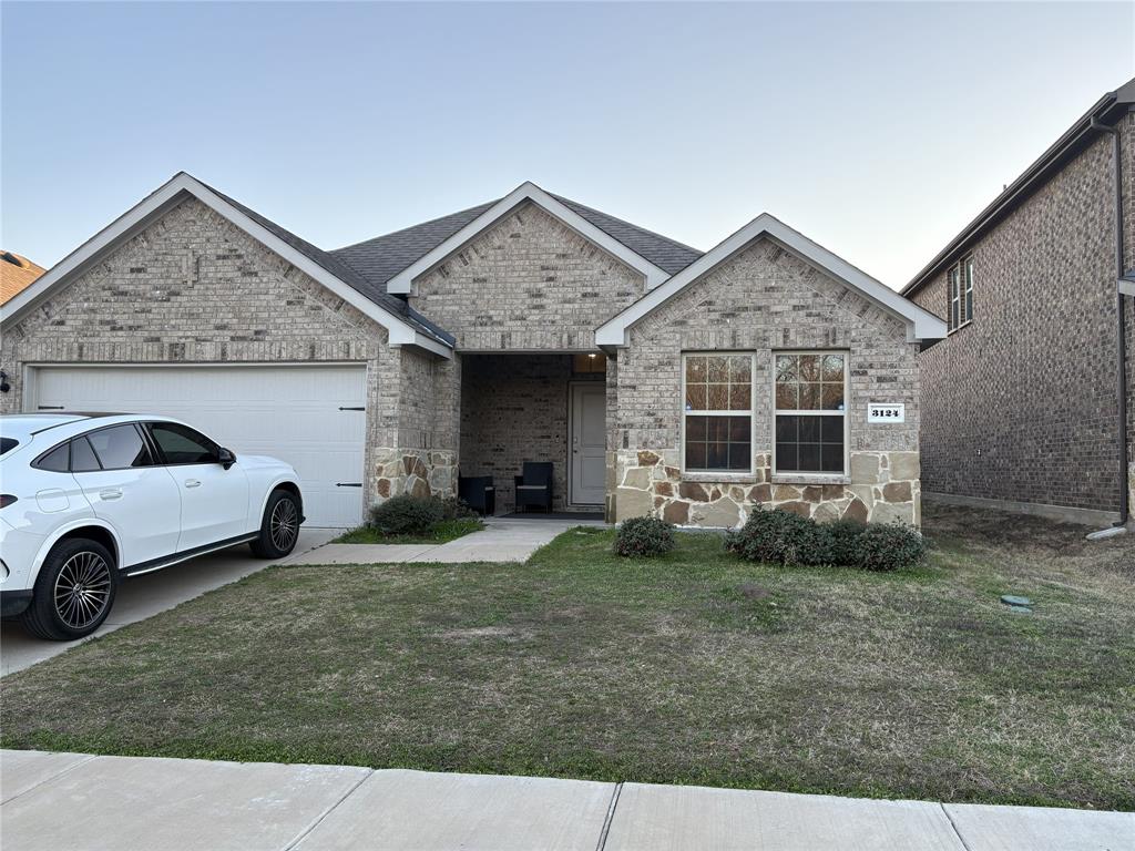 3124 Patton Lane Forney, TX 75126 - Photo 1 of 19 a view of a house with a yard