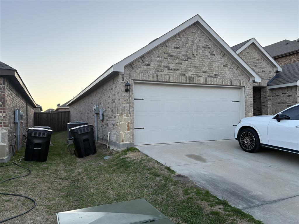 3124 Patton Lane Forney, TX 75126 - Photo 2 of 19 a view of a car garage