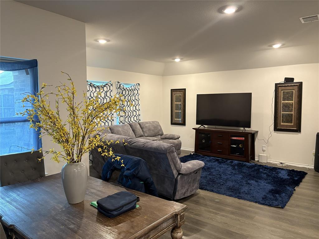 3124 Patton Lane Forney, TX 75126 - Photo 10 of 19 a living room with furniture and a flat screen tv