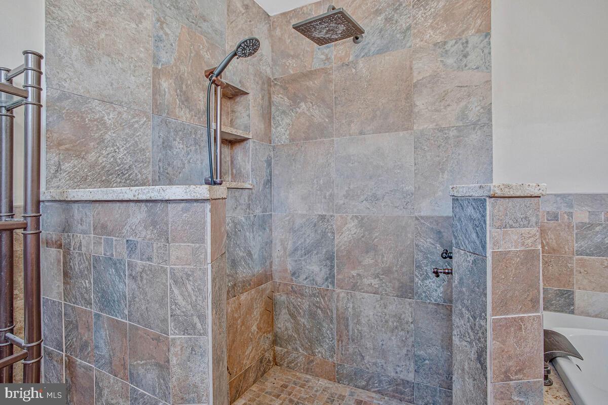 9230 Sam Owing's Place Owings, MD 20736 - Photo 29 of 44 a bathroom with a shower