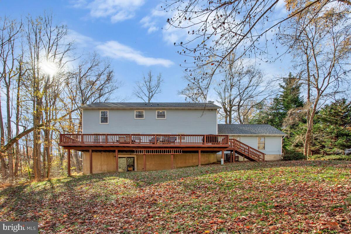 9230 Sam Owing's Place Owings, MD 20736 - Photo 42 of 44 a front view of a house with a yard