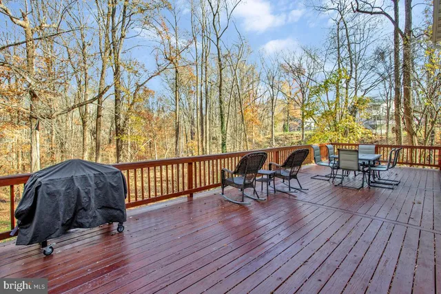 a view of a chairs and table on the wooden floor
