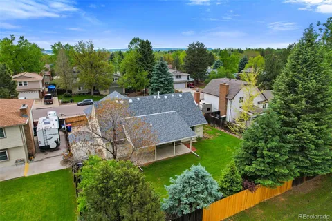 an aerial view of a house with garden space and outdoor space