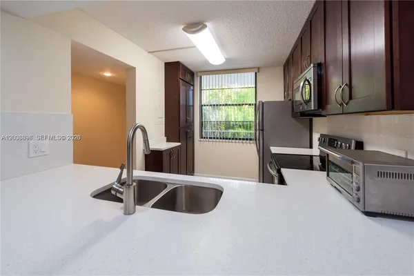 $350,000 | 1530 Whitehall Drive, Unit 302, Davie, FL 33324