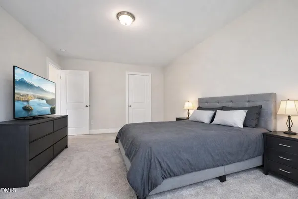 an empty room with a empty space and windows