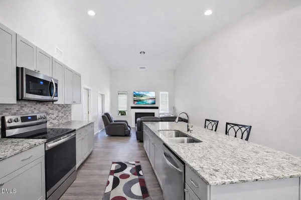 a picture of a bench in front of a white wall