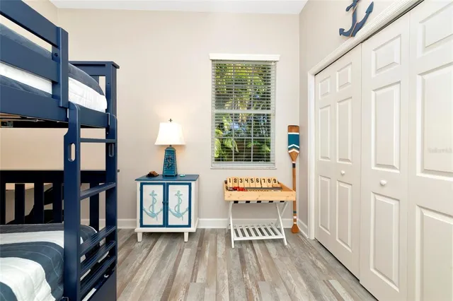 a view of a bedroom with furniture and staircase