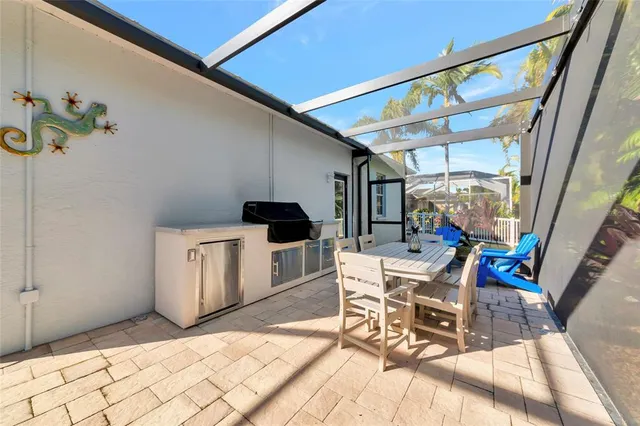 a view of a swimming pool with a patio