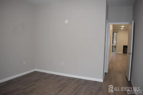 a view of small space with empty racks on the wall