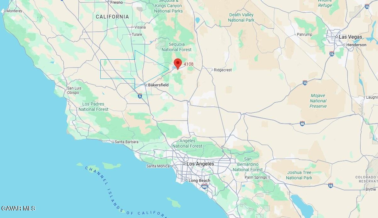 4108 Goat Ranch Road Lake Isabella, CA 93240 - Photo 12 of 16 a close up of a white vase with flowers