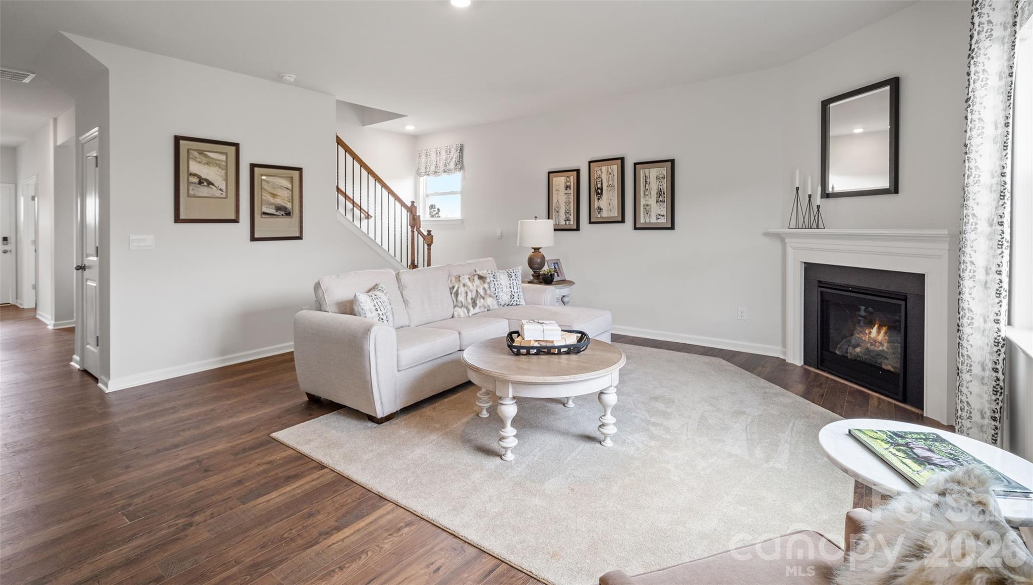 150 Salers Road Fletcher, NC 28732 - Photo 11 of 34 a living room with furniture and a fireplace