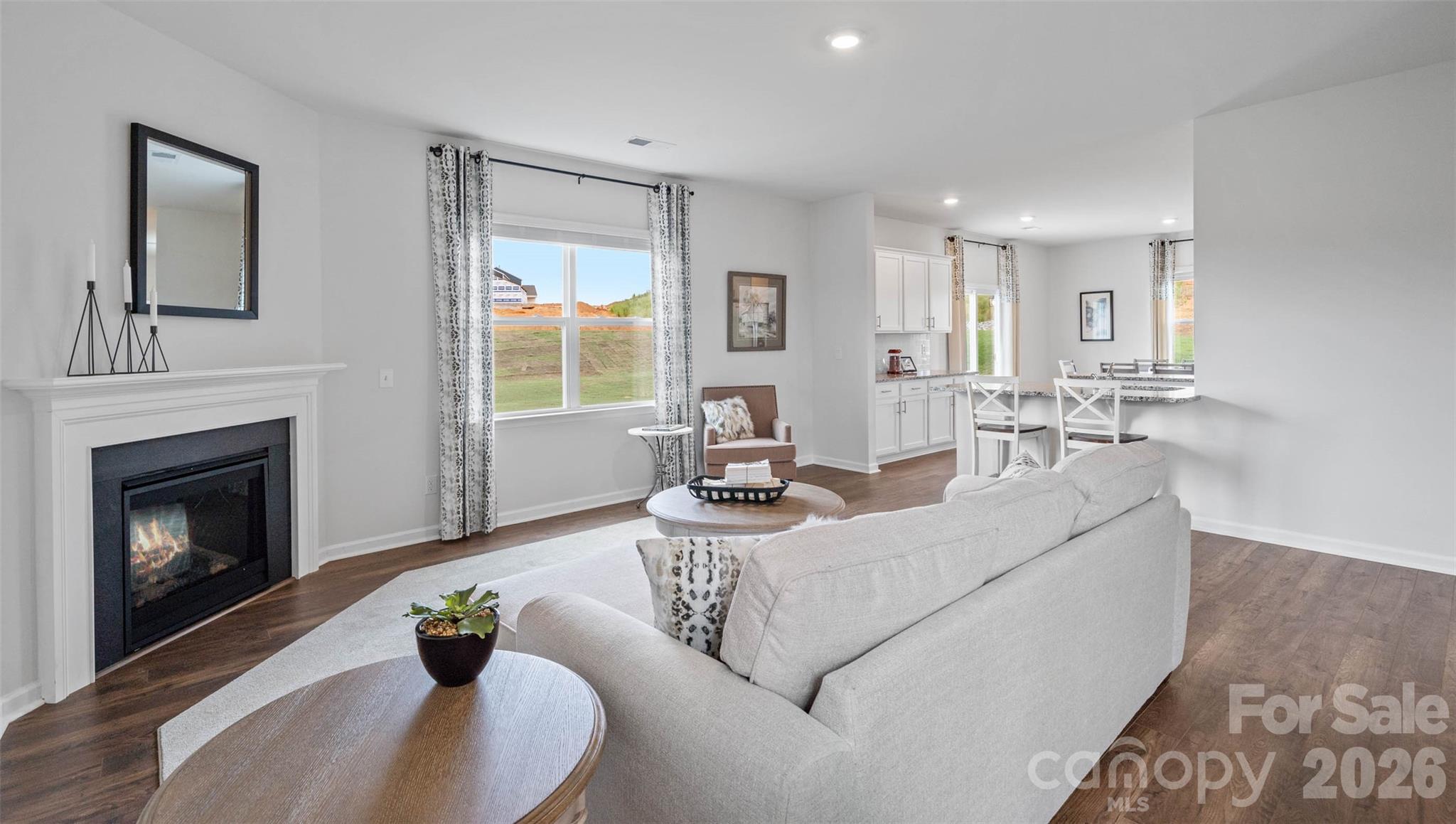 150 Salers Road Fletcher, NC 28732 - Photo 13 of 34 a living room with furniture and a fireplace