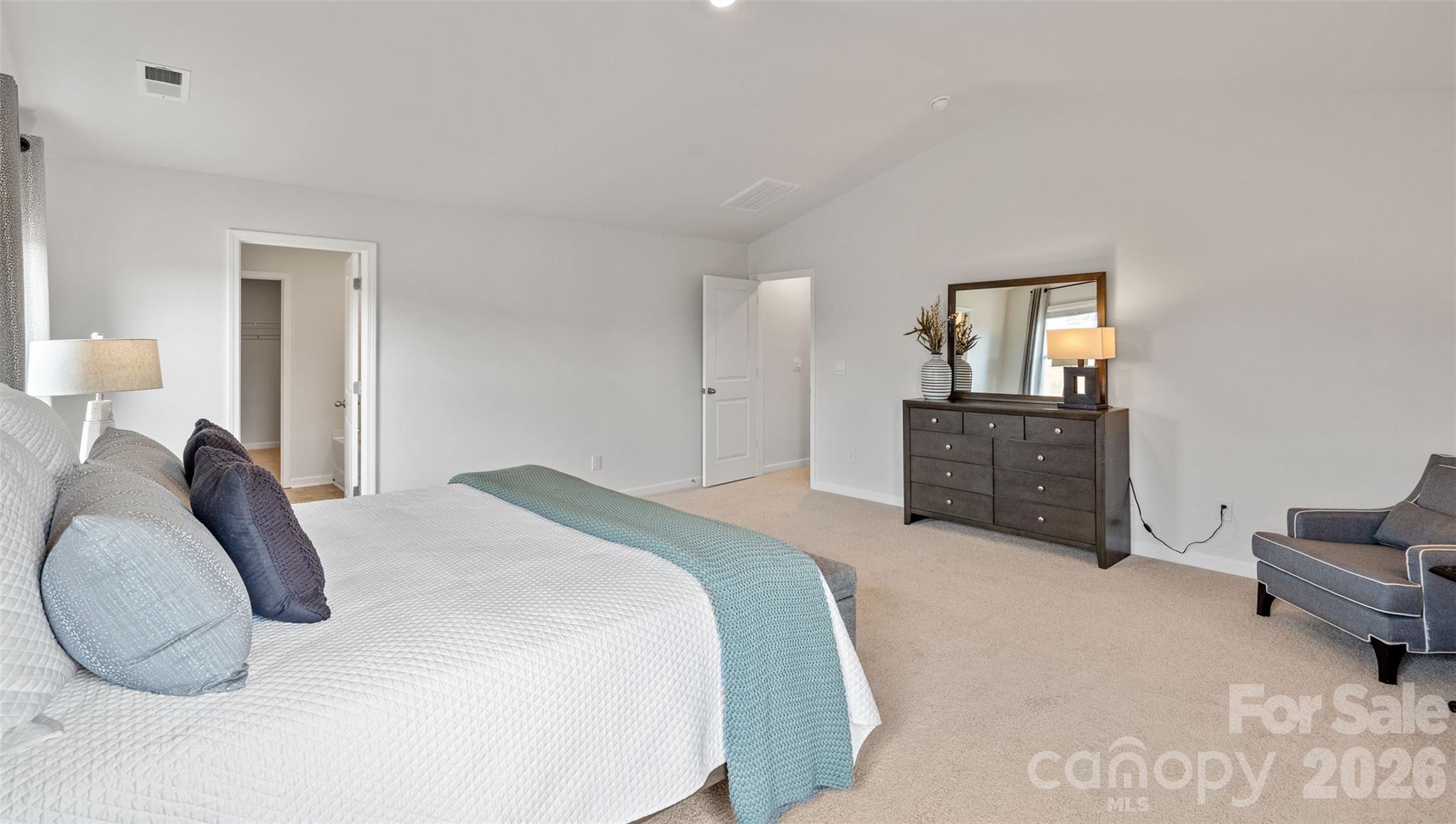 150 Salers Road Fletcher, NC 28732 - Photo 27 of 34 a spacious bedroom with a bed and window