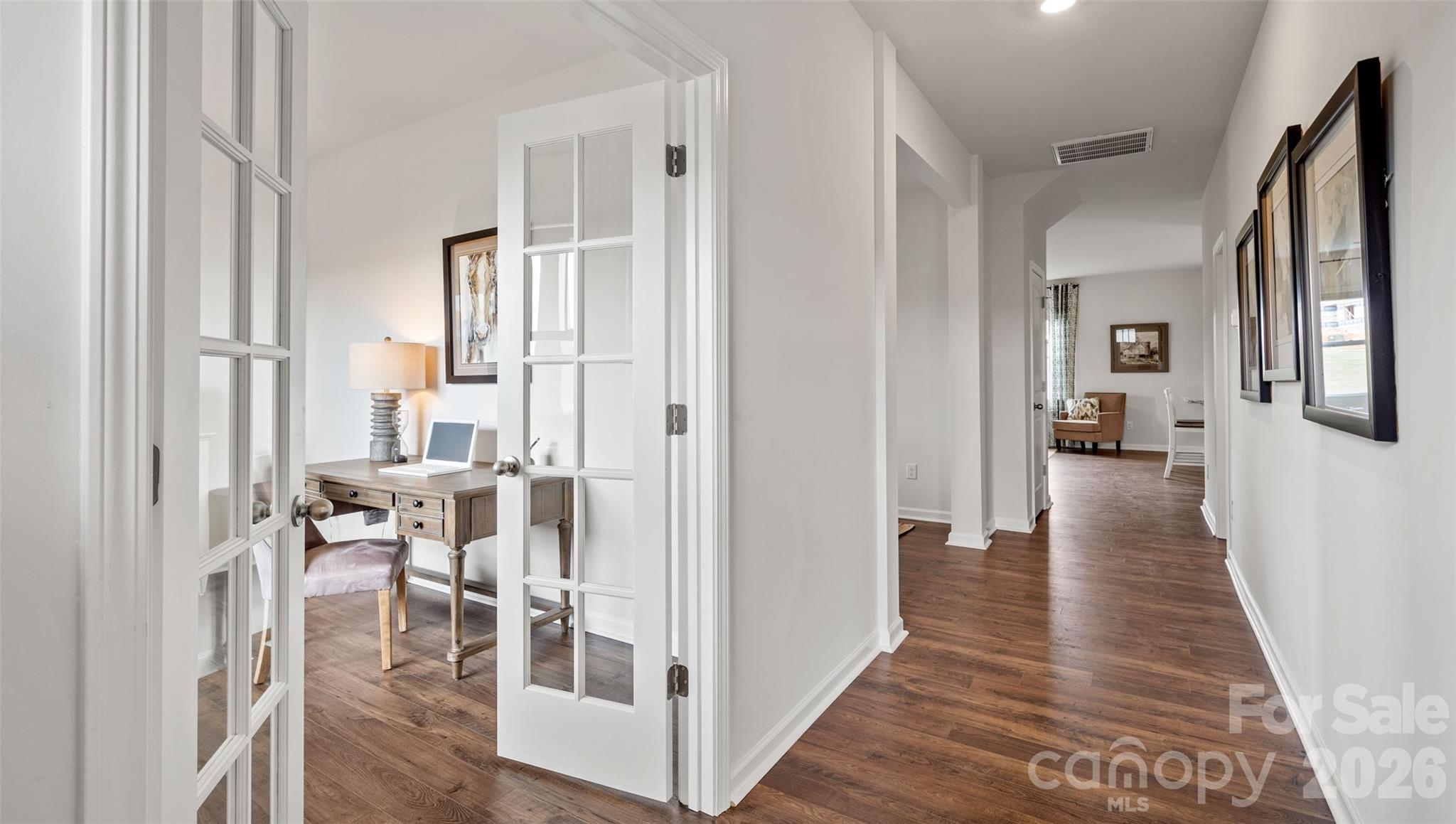 150 Salers Road Fletcher, NC 28732 - Photo 6 of 34 a view of a livingroom with wooden floor and furniture