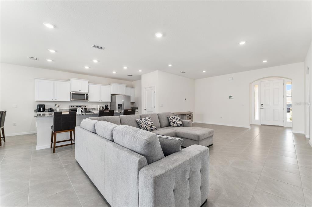 4098 Northwest 48th Terrace Ocala, FL 34482 - Photo 15 of 58 a living room with furniture and kitchen view