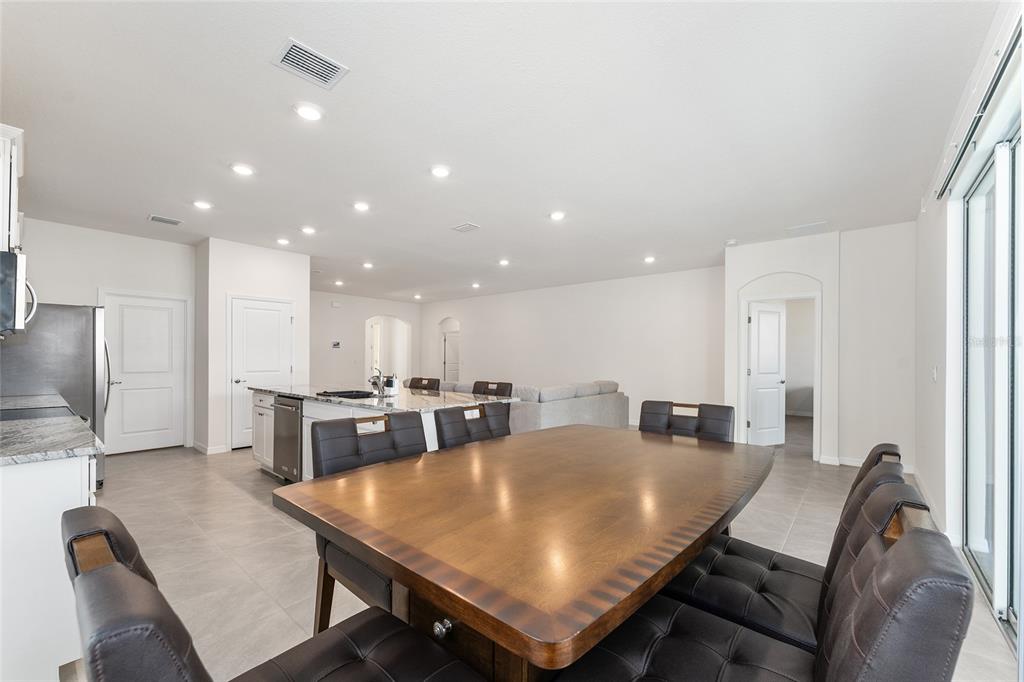 4098 Northwest 48th Terrace Ocala, FL 34482 - Photo 25 of 58 a large dining space with furniture