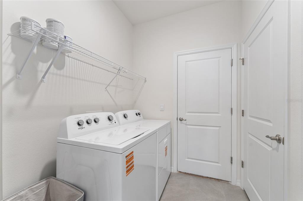 4098 Northwest 48th Terrace Ocala, FL 34482 - Photo 39 of 58 a utility room with dryer and washer