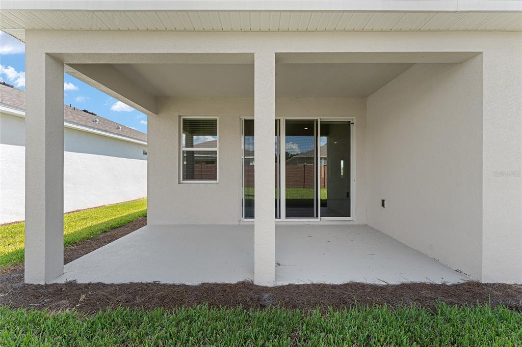 4098 Northwest 48th Terrace Ocala, FL 34482 - Photo 53 of 58 front view of a house with a yard