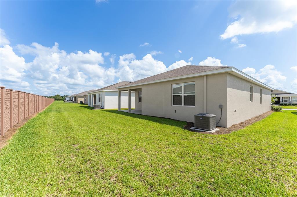 4098 Northwest 48th Terrace Ocala, FL 34482 - Photo 58 of 58 a view of a house with backyard