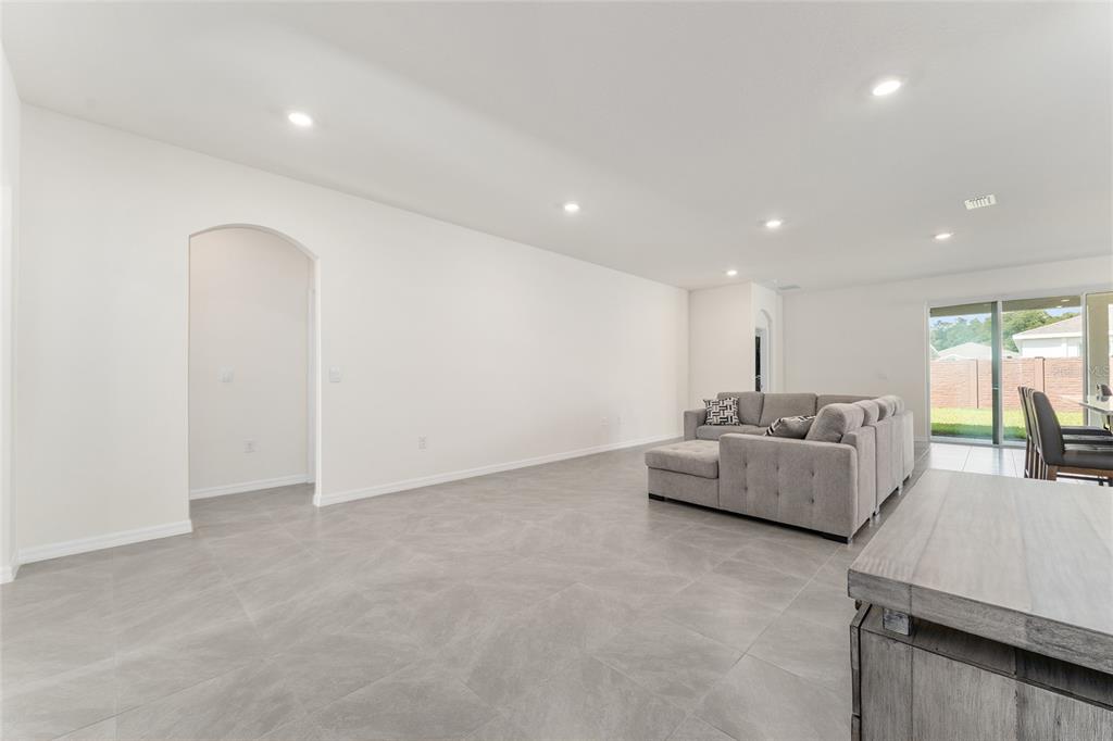 4098 Northwest 48th Terrace Ocala, FL 34482 - Photo 10 of 58 a living room with furniture and a large window