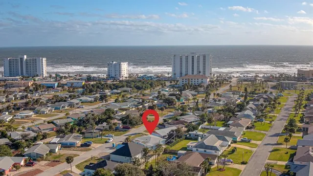 a view of room with a ceiling fan and window