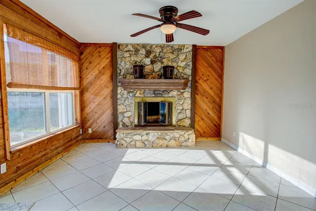a spacious bathroom with a bathtub sink and mirror