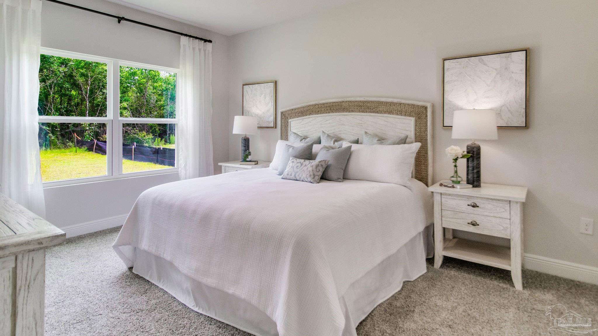 8650 Russellcross Boulevard Pensacola, FL 32507 - Photo 11 of 28 a bedroom with a bed and a window