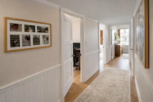 a view of hallway with livingroom