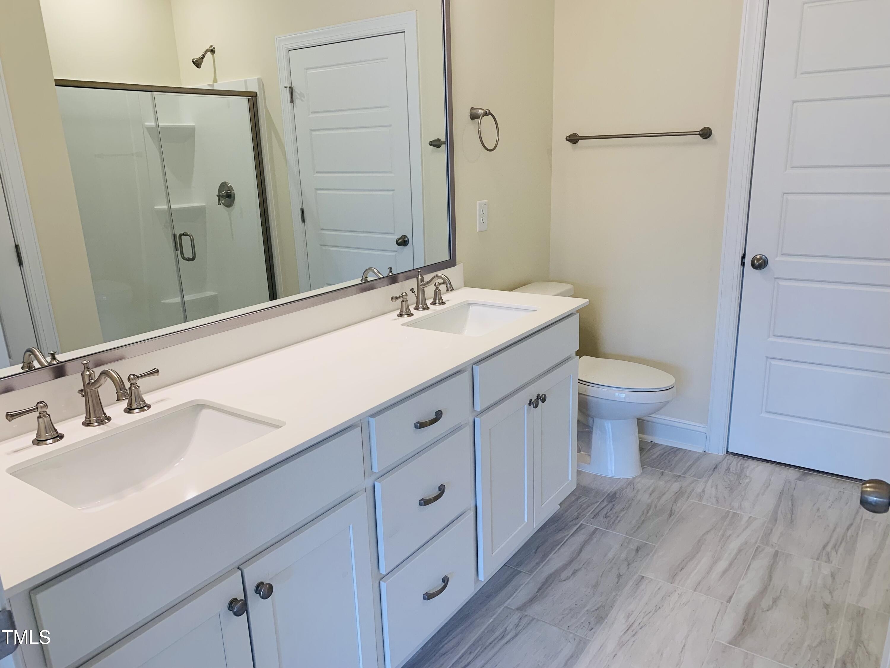 403 Weather Ridge Lane, Unit 42 Cary, NC 27513 - Photo 10 of 17 {WCC 403 Primary Bath Vanity