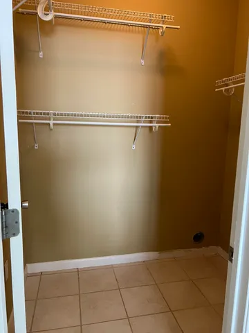 a view of a room with racks on the wall