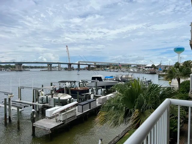 a view of a lake with outdoor seating