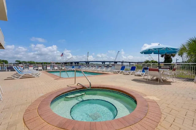 swimming pool view with a outdoor seating space