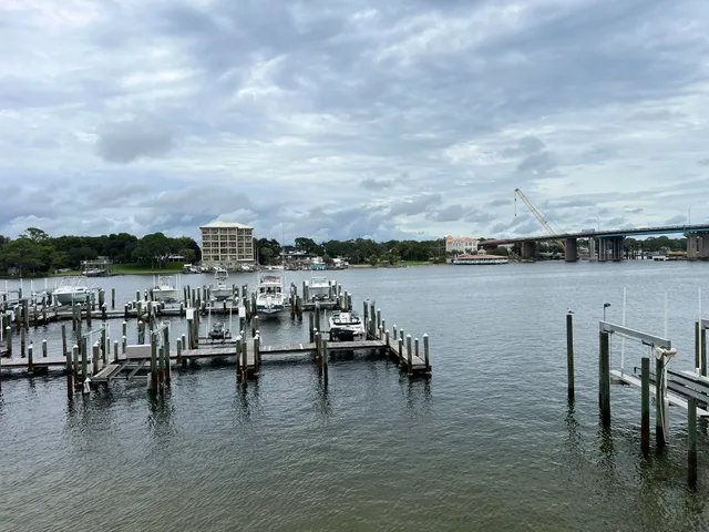 a view of a lake with outdoor seating