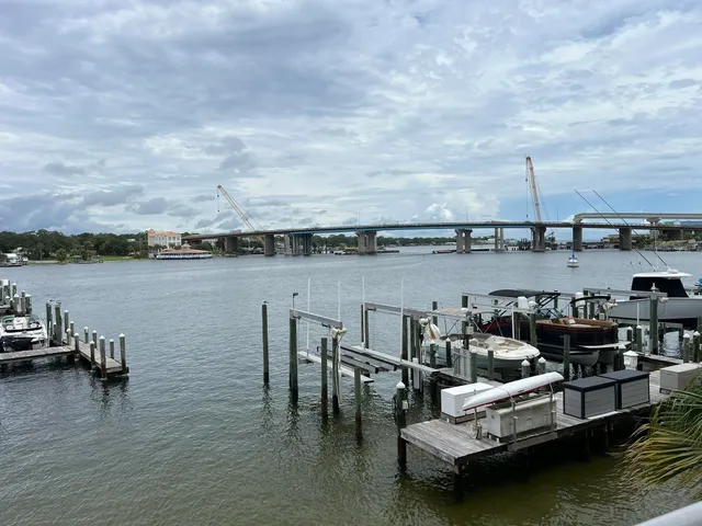 a view of a lake with outdoor seating