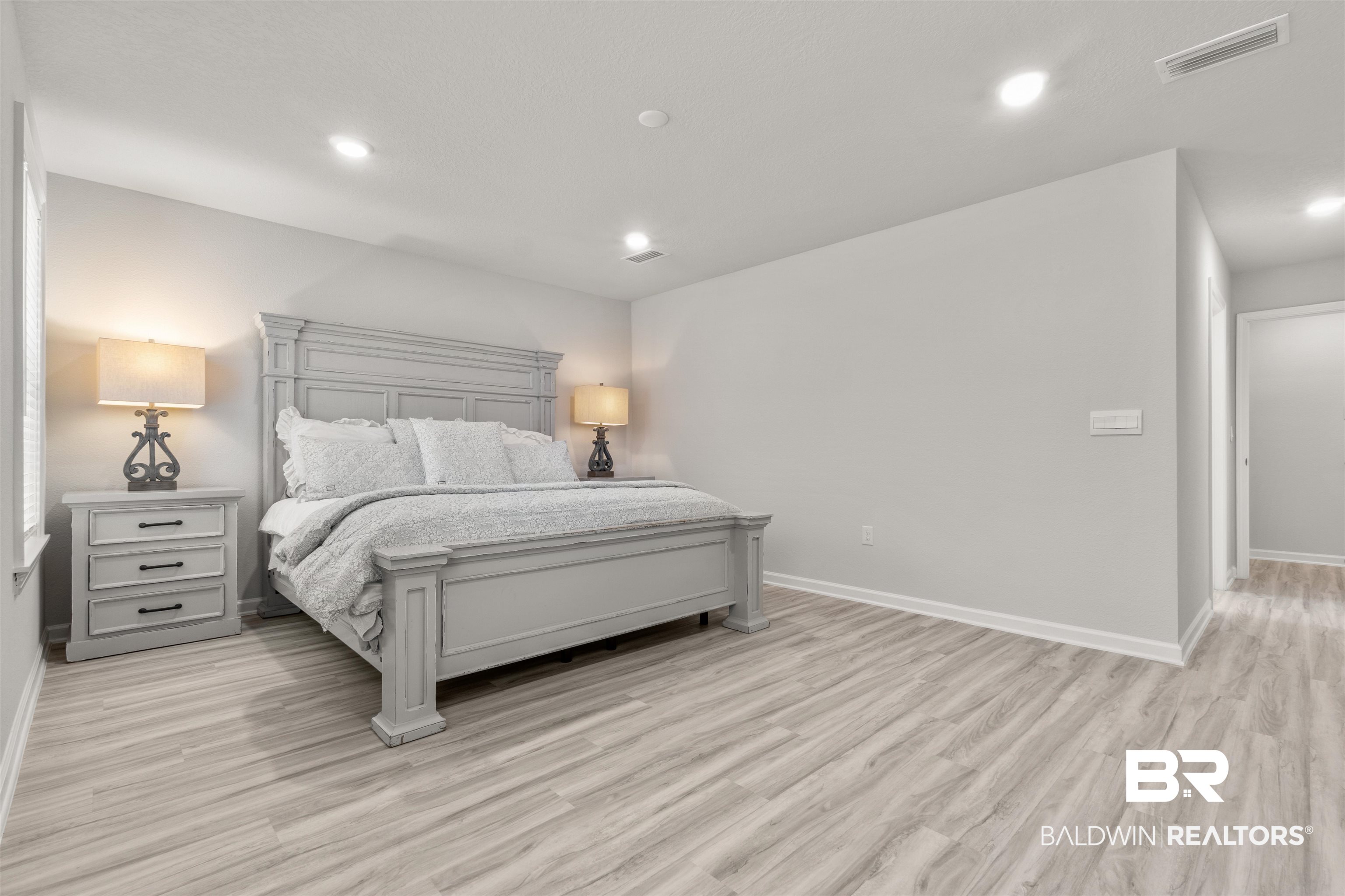 24472 Ringneck Loop Elberta, AL 36530 - Photo 19 of 46 Bedroom with light wood-type flooring